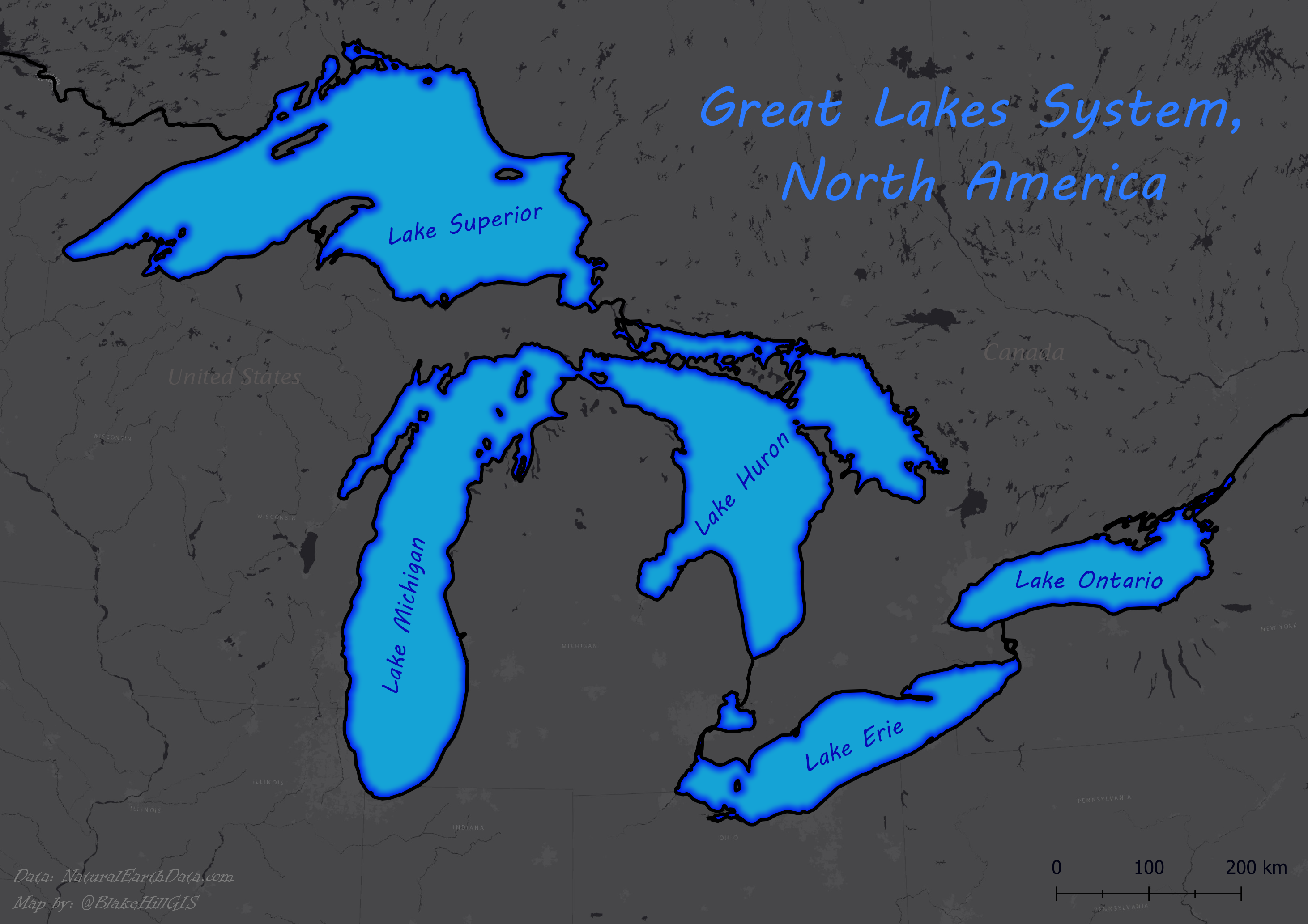 alt: A dark basemap with highlighted boundaries of the great lakes system and the five Great Lakes labeled